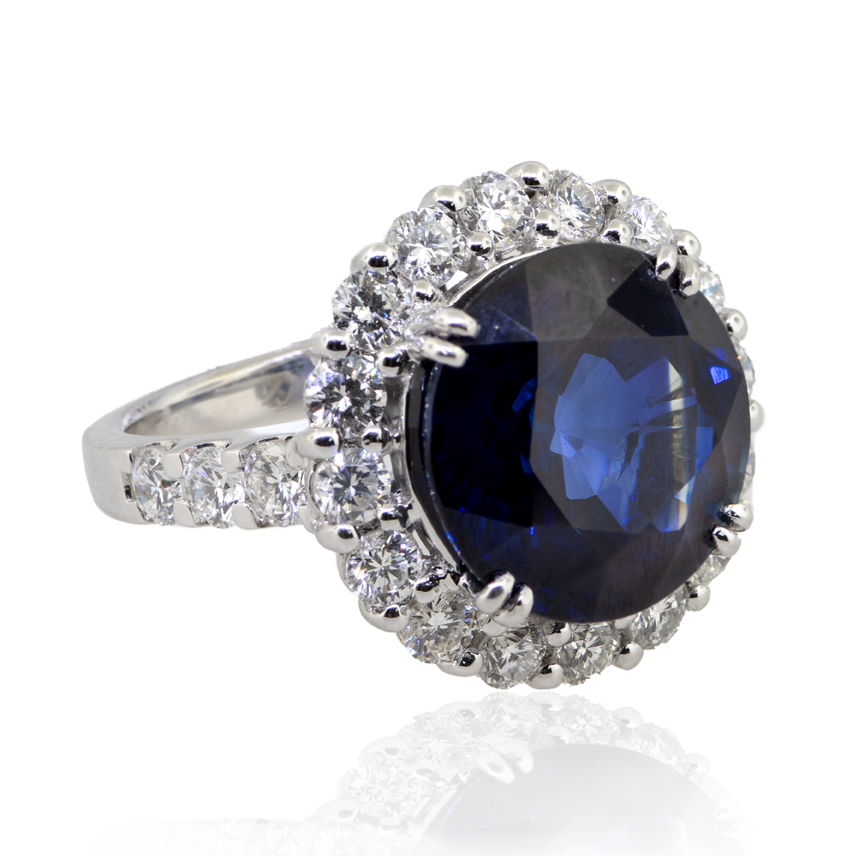 18KW 11.90gm. Sapphire & Diamond Ring SA 1=12.140t GIA.