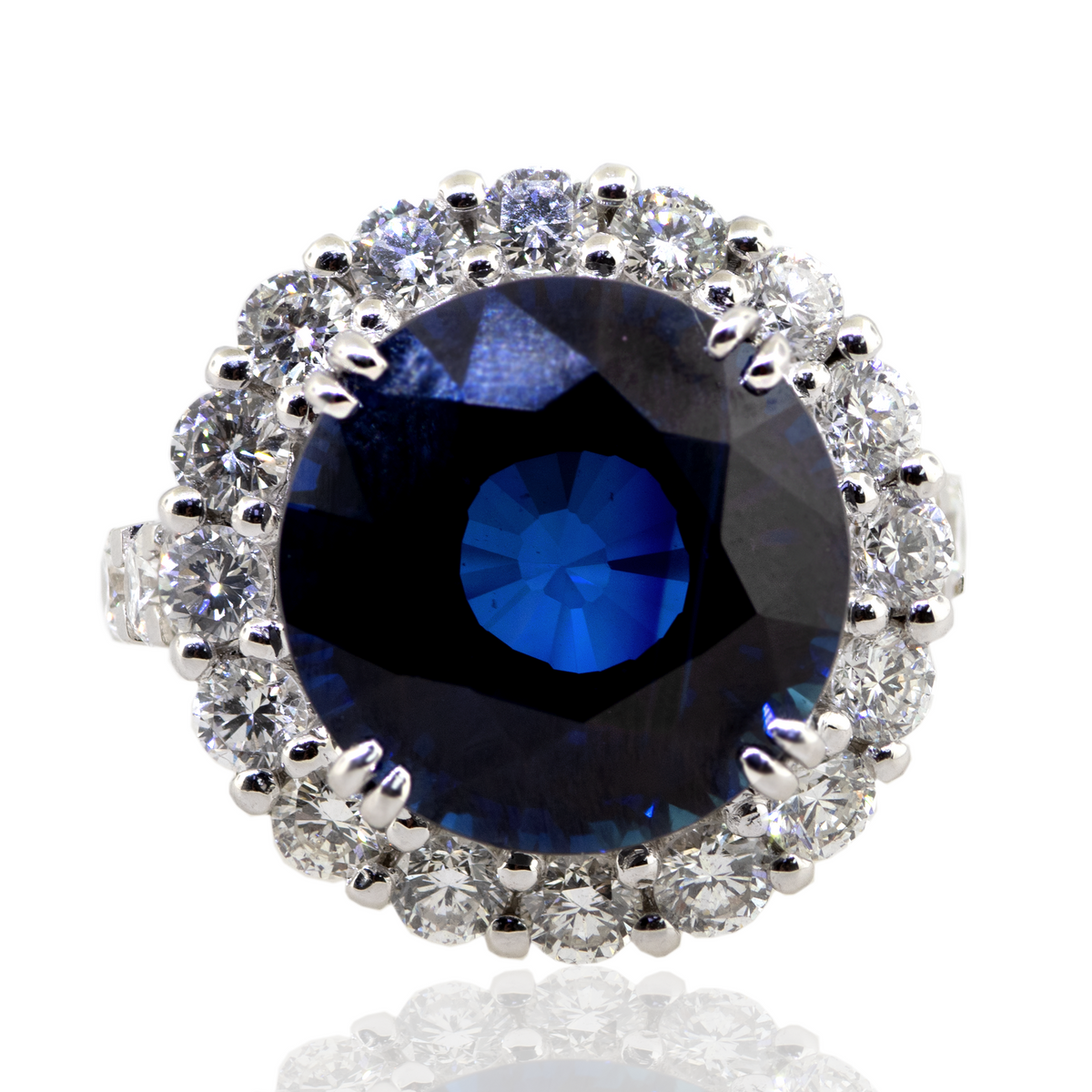 18KW 11.90gm. Sapphire & Diamond Ring SA 1=12.140t GIA.