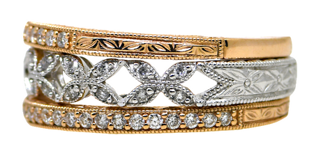 Three gold and silver bracelets on a white background
