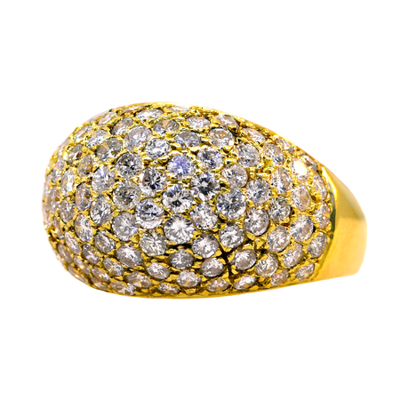 Gold ring with diamond accents on a white background