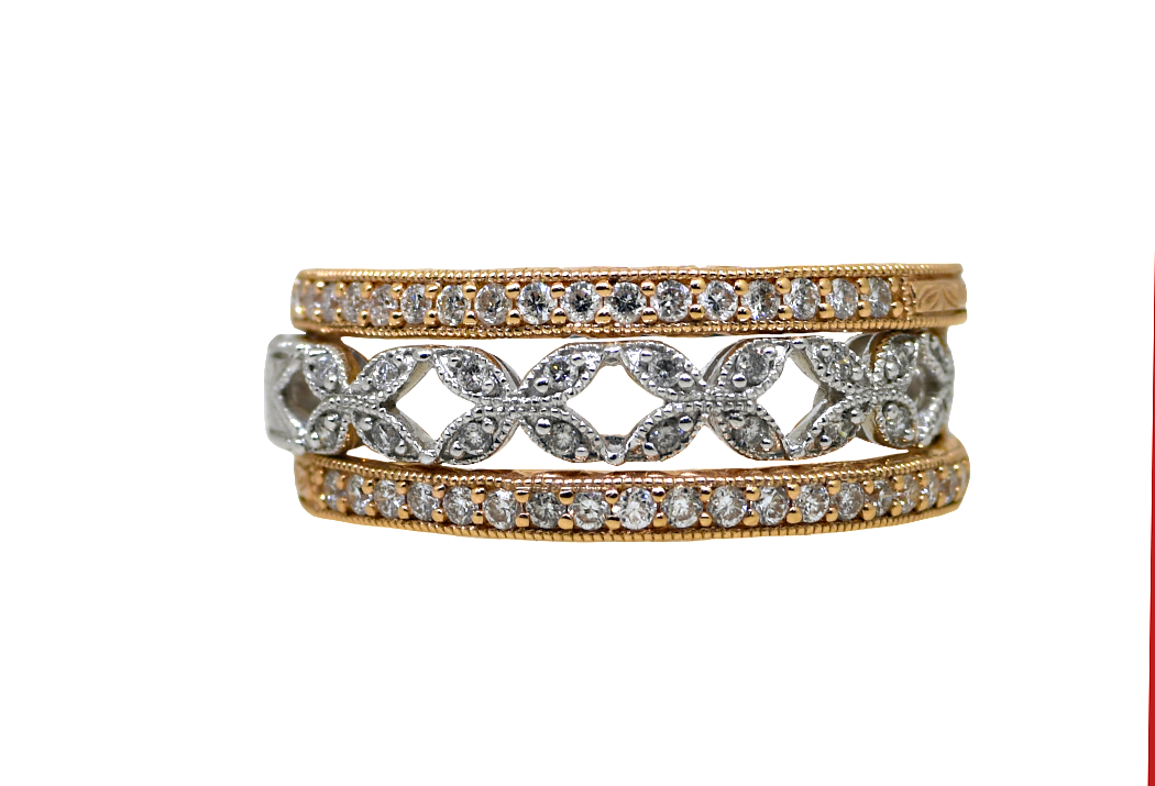 Set of three diamond-studded rings on a white background