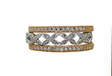 Set of three diamond-studded rings on a white background