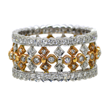 Two diamond-studded rings with gold and silver bands on a white background