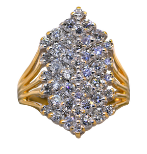 Gold ring with a cluster of diamonds on a white background