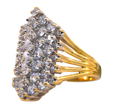 Gold ring with diamond accents on a white background